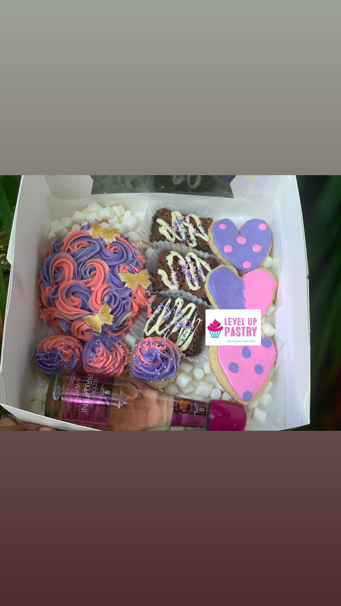 Celebration dessert box with cupcakes, brownies and sugar cookies